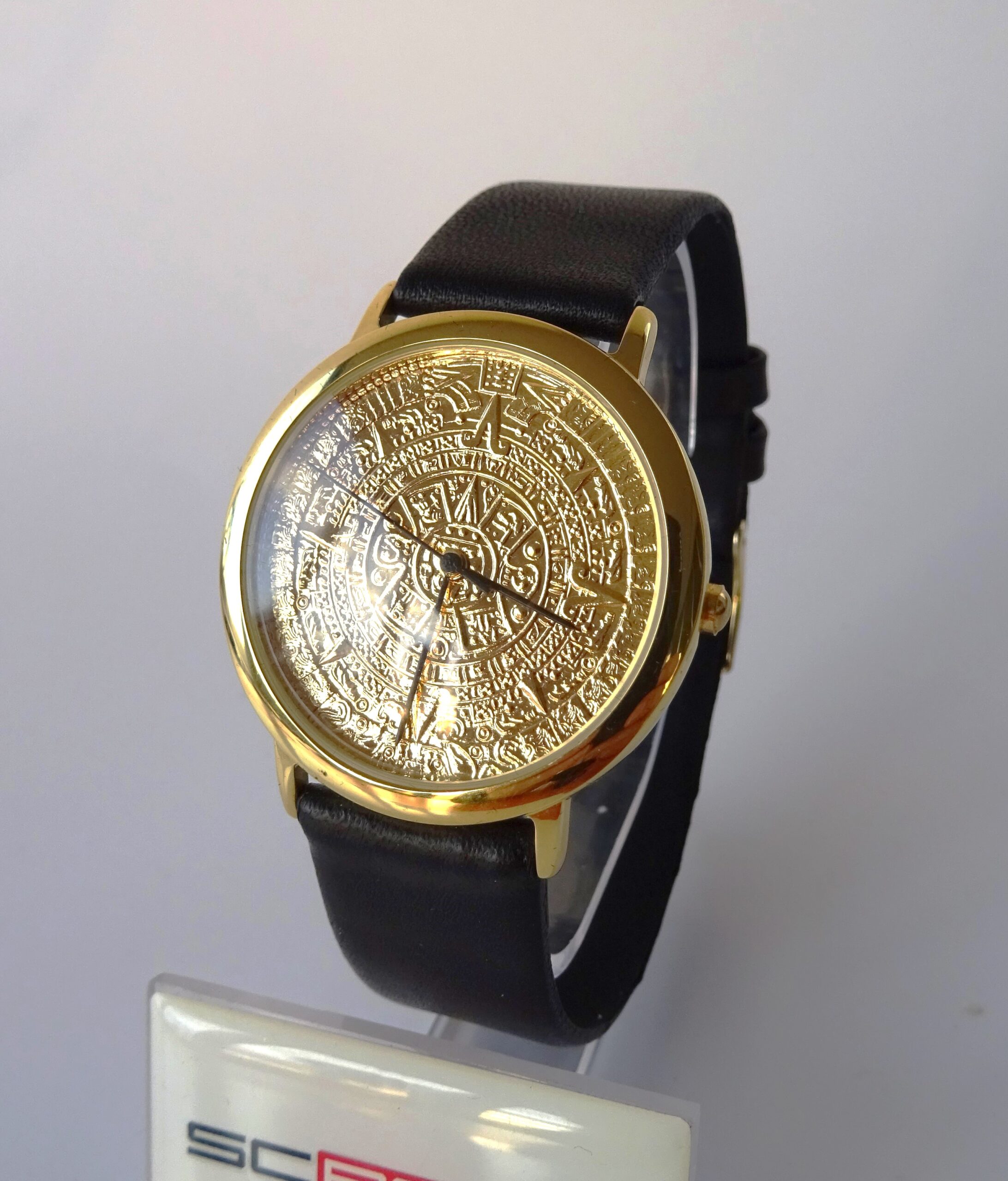 Hodinky s pozlaceným ciferníkem Aztécký kalendář