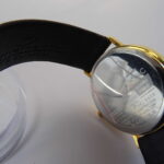 Hodinky s pozlaceným ciferníkem Aztécký kalendář